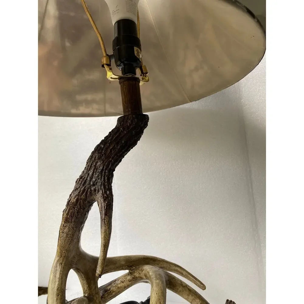rustic table lamp featuring a base made of camo-patterned fabric lampshade